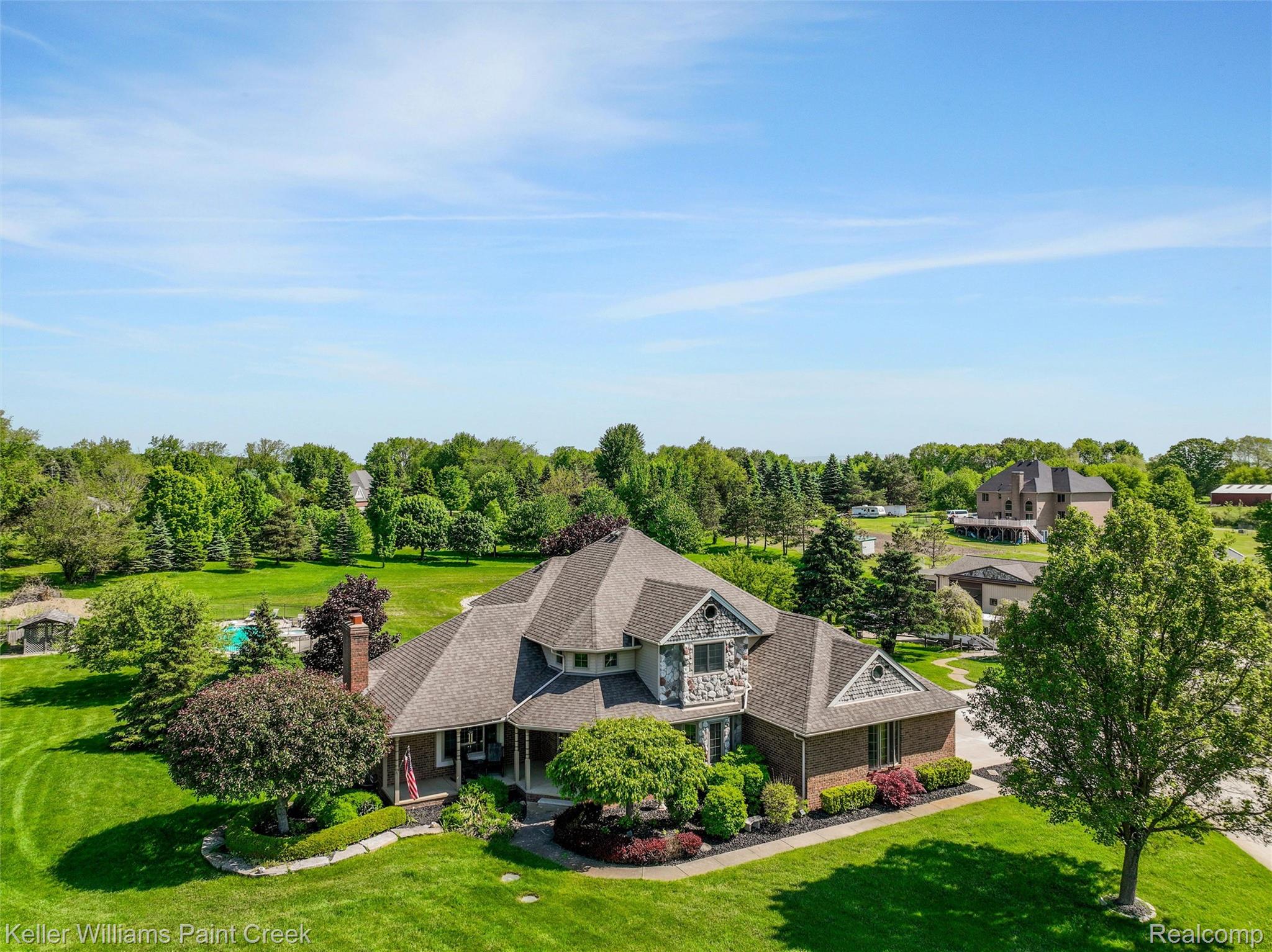 5813 36 Mile Road Romeo, MI 48065 - Photo 53 of 81 Expansive brick and stone residence featuring a multi-gabled roofline
