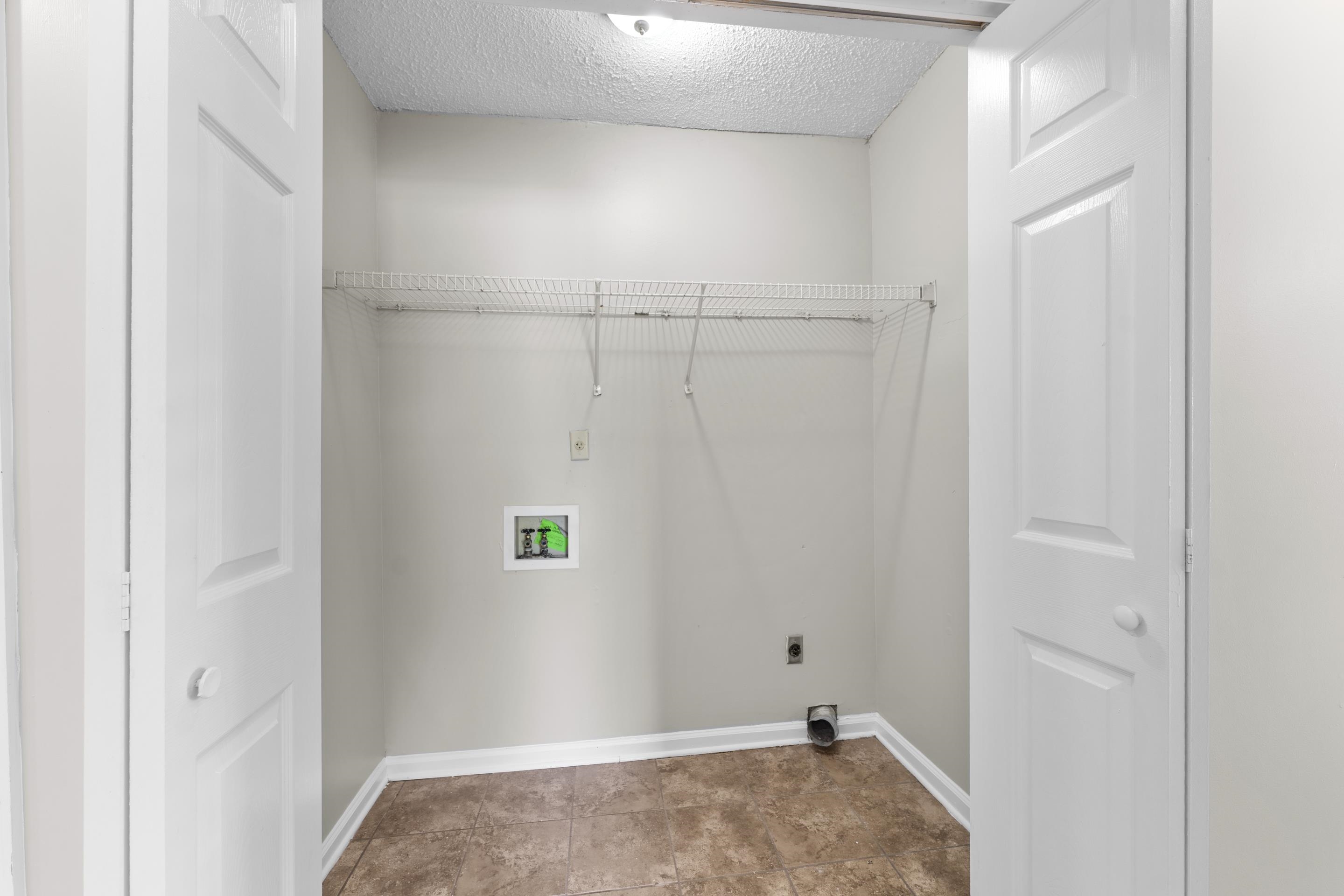 5339 Shady Ridge Cove Memphis, TN 38141 - Photo 25 of 31 Functional laundry closet conveniently located inside the home with washer and dryer connection.