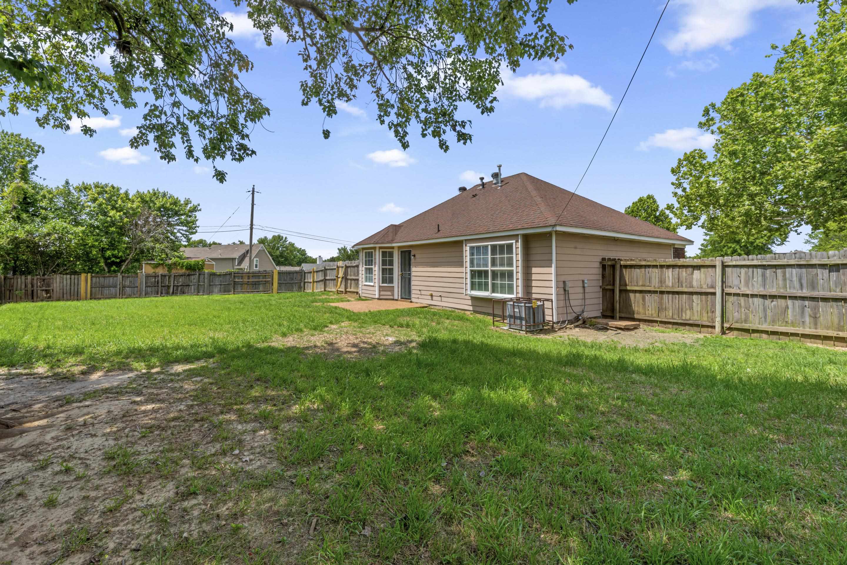 5339 Shady Ridge Cove Memphis, TN 38141 - Photo 29 of 31 This oversized fenced backyard provides endless possibilities with open green space.
