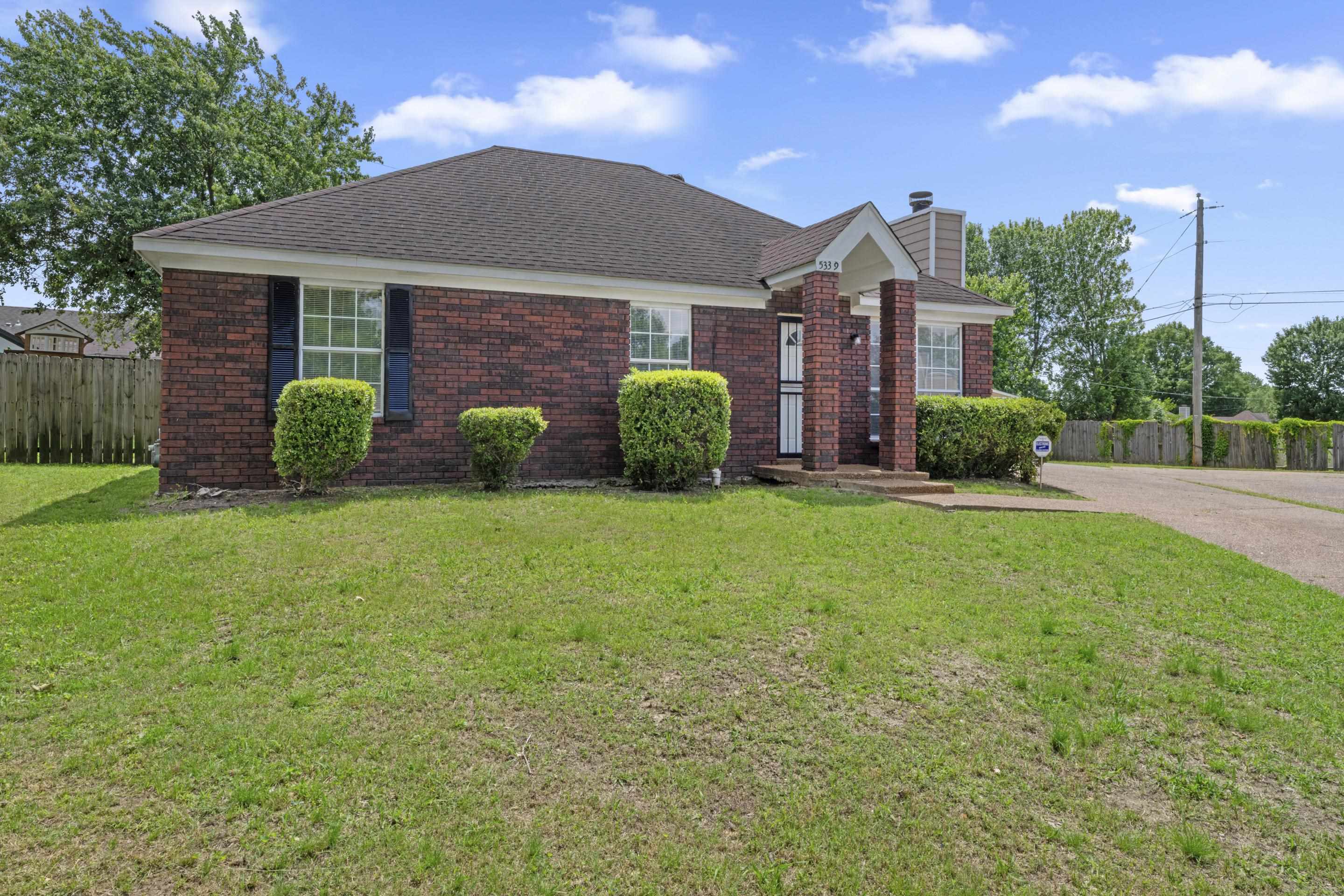 5339 Shady Ridge Cove Memphis, TN 38141 - Photo 31 of 31 This move-in ready home features attractive brick exterior details, low-maintenance landscaping, and a long driveway for convenient parking.