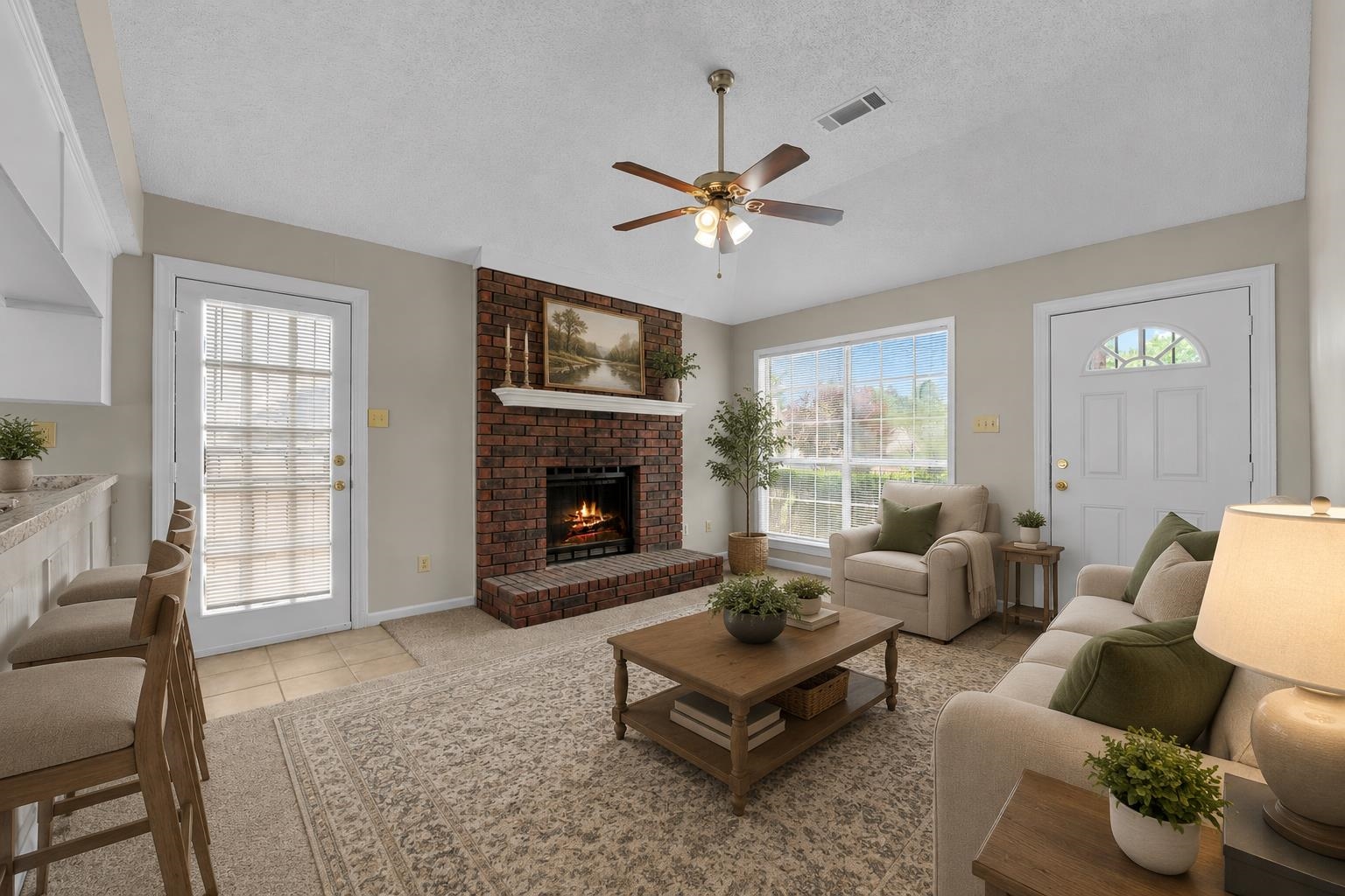 5339 Shady Ridge Cove Memphis, TN 38141 - Photo 6 of 31 Natural light pours into the great room through oversized windows while the cozy fireplace creates the perfect focal point. The open-concept layout makes the home feel bright, airy, and comfortable.