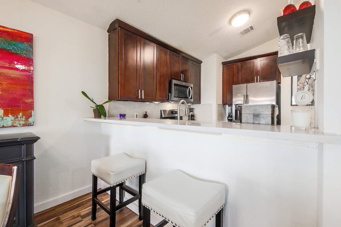 16806 Langland Road Pflugerville, TX 78660 - Photo 17 of 31 a bathroom with a sink and a mirror
