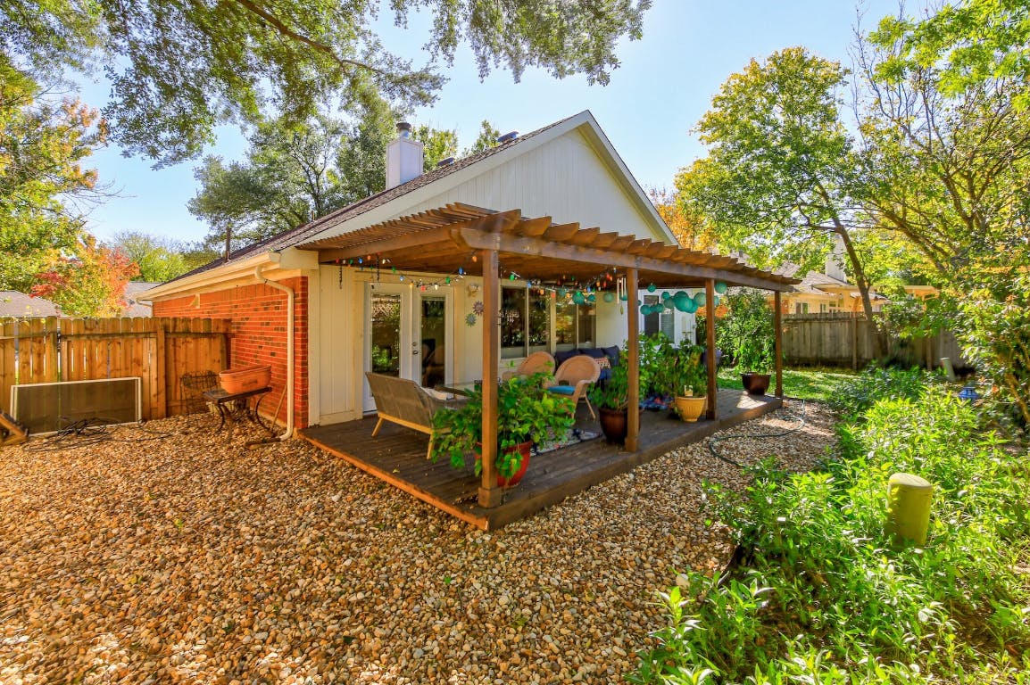 16806 Langland Road Pflugerville, TX 78660 - Photo 23 of 31 a view of a house with garden