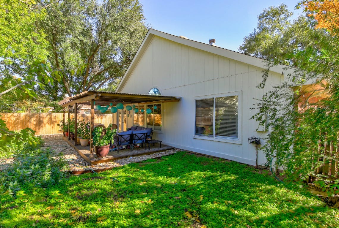 16806 Langland Road Pflugerville, TX 78660 - Photo 26 of 31 a backyard of a house with seating space