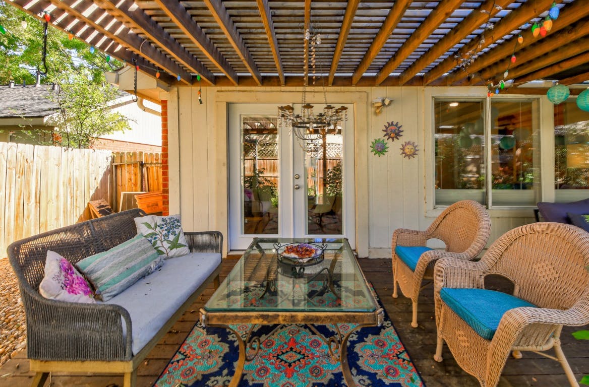 16806 Langland Road Pflugerville, TX 78660 - Photo 28 of 31 a bedroom with furniture and a large window