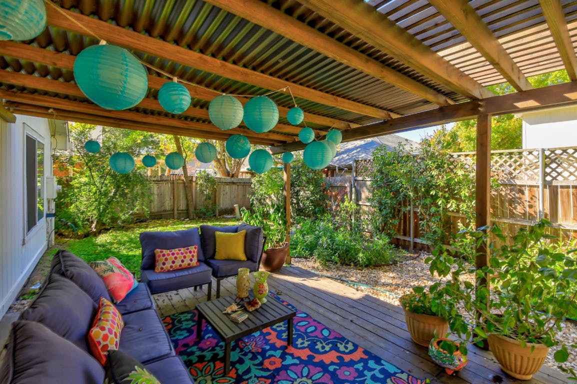16806 Langland Road Pflugerville, TX 78660 - Photo 29 of 31 a outdoor living space with furniture and garden view