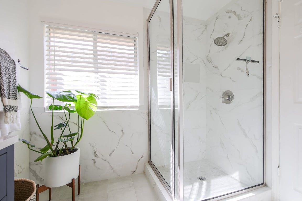 16806 Langland Road Pflugerville, TX 78660 - Photo 9 of 31 a white vase with flowers sitting on a table