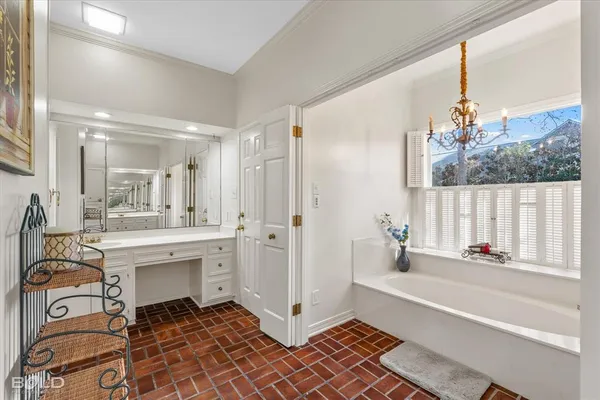 a bathroom with a sink a mirror and a bathtub