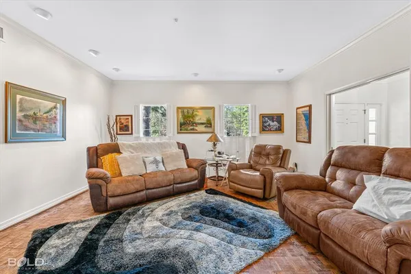 a living room with furniture and a couch