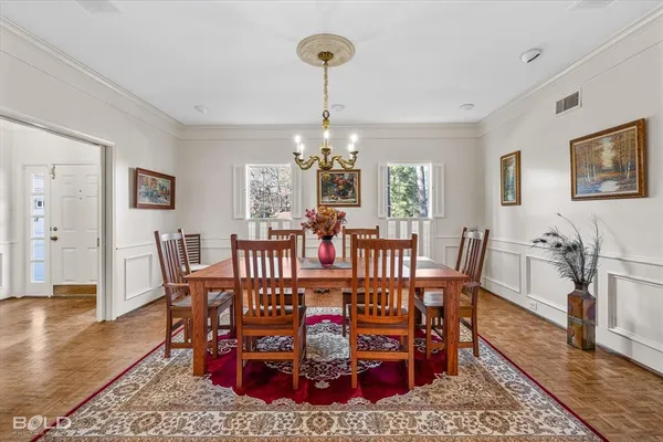 a view of a dining room with furniture