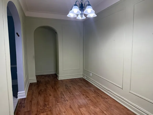 a view of livingroom with hardwood floor and hallway