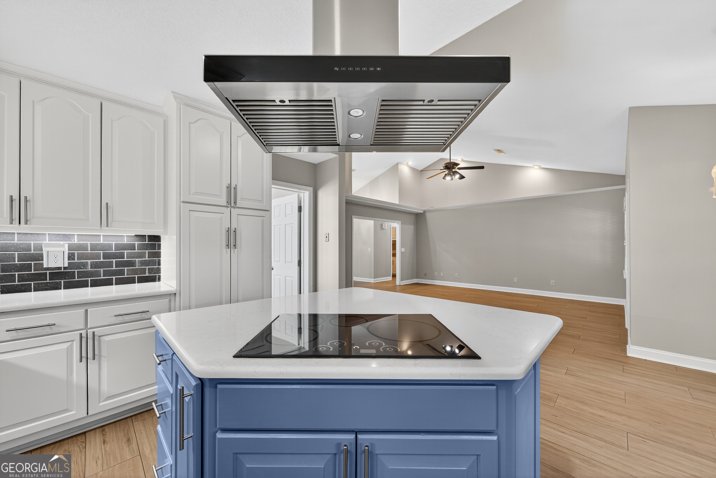 404 Morning Glory Road St. Marys, GA 31558 - Photo 13 of 34 a kitchen that has a sink and a stove