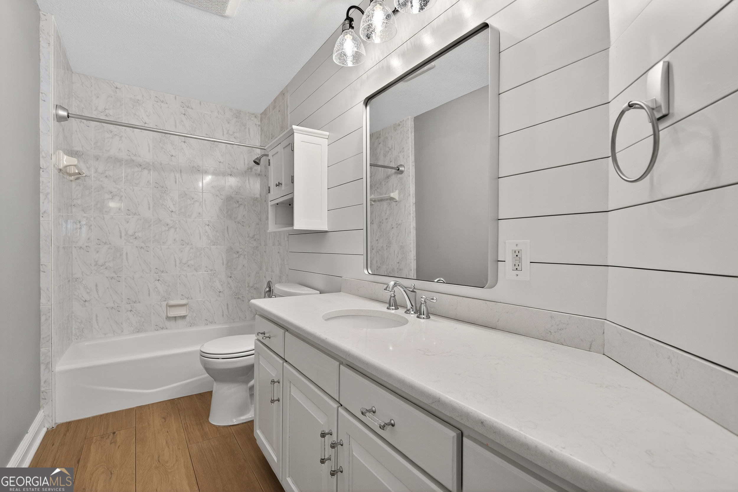 404 Morning Glory Road St. Marys, GA 31558 - Photo 24 of 34 a bathroom with a sink a toilet and shower