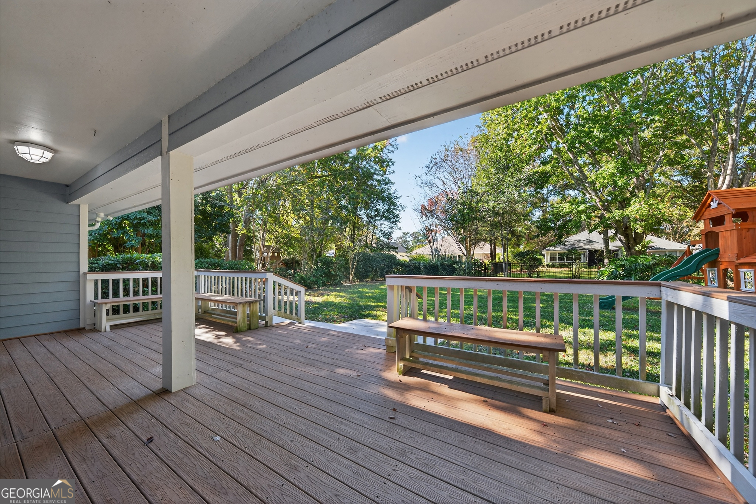 404 Morning Glory Road St. Marys, GA 31558 - Photo 27 of 34 a view of deck with chairs and wooden floor