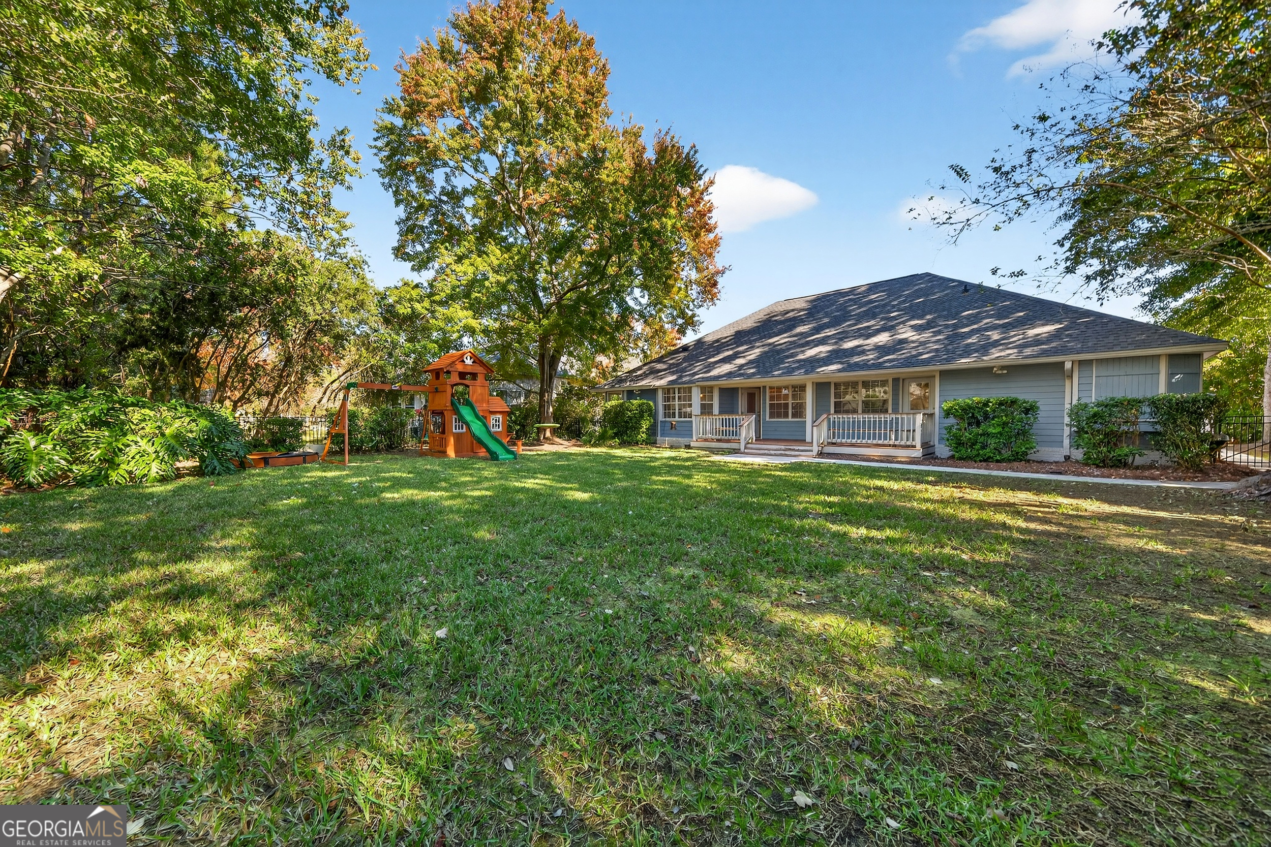 404 Morning Glory Road St. Marys, GA 31558 - Photo 29 of 34 a front view of a house with a yard