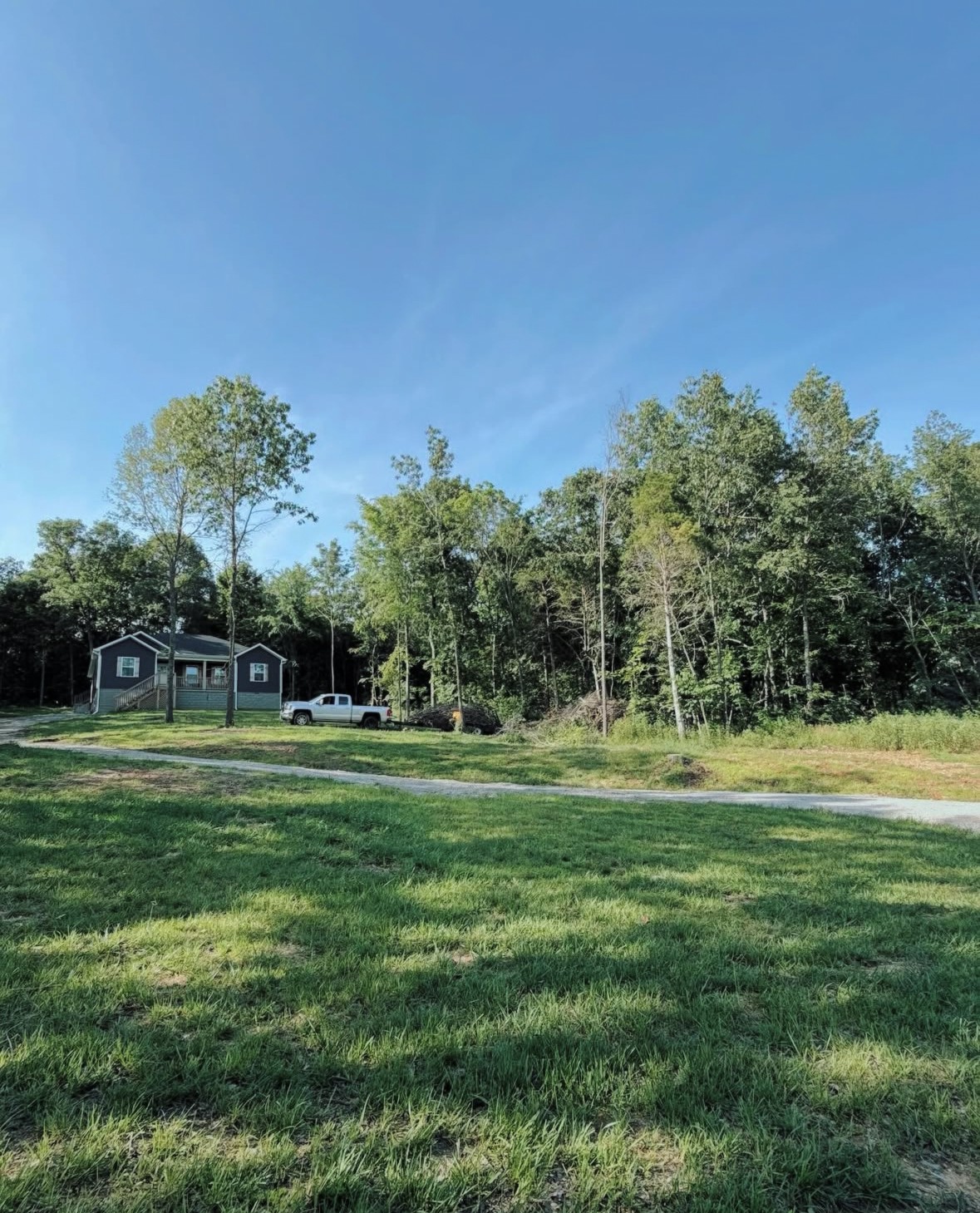 1360 Clay Cole Road Elkton, KY 42220 - Photo 1 of 1 a view of a grassy field with trees