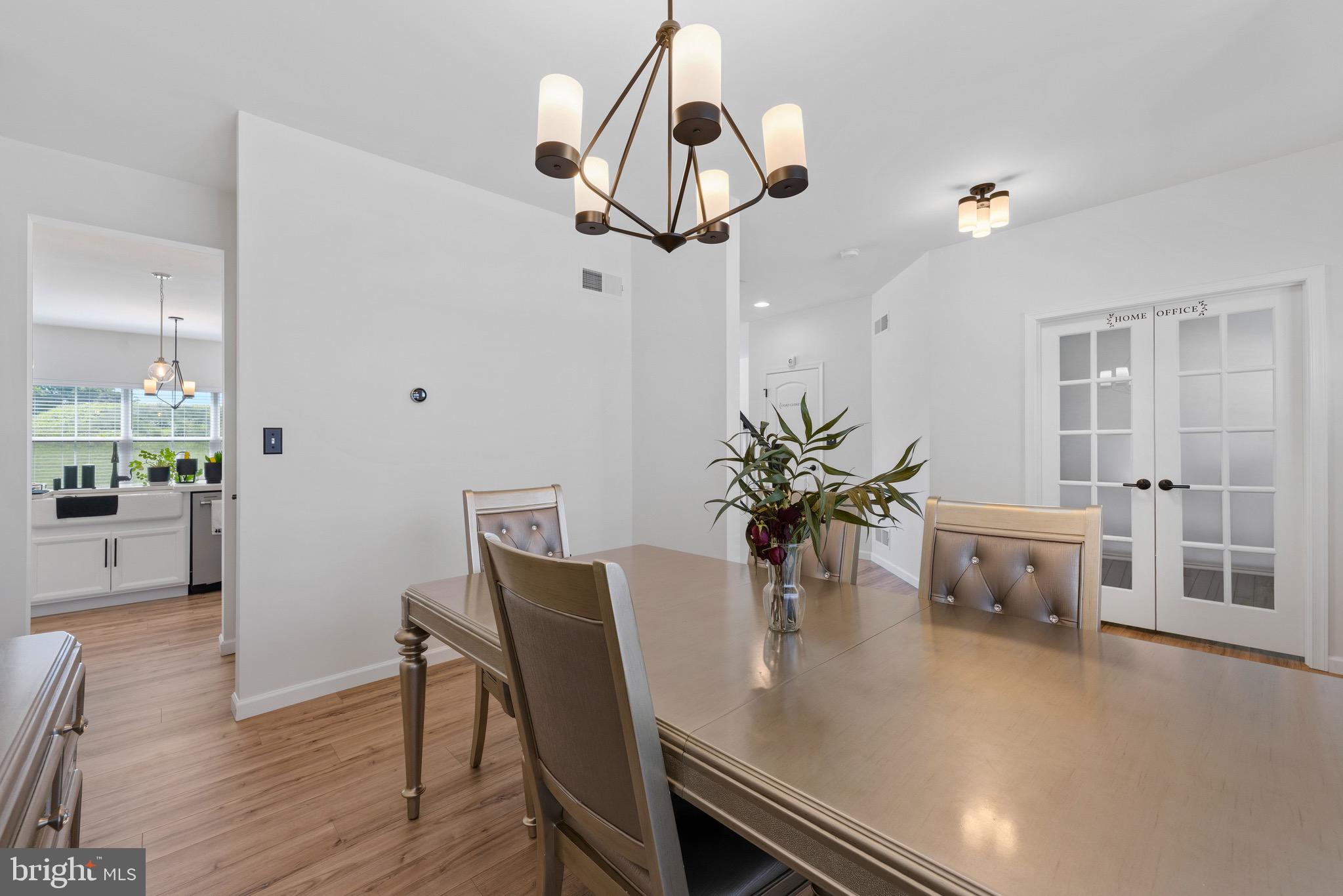 79 Beck Road York, PA 17403 - Photo 12 of 38 a view of a dining room with furniture and wooden floor
