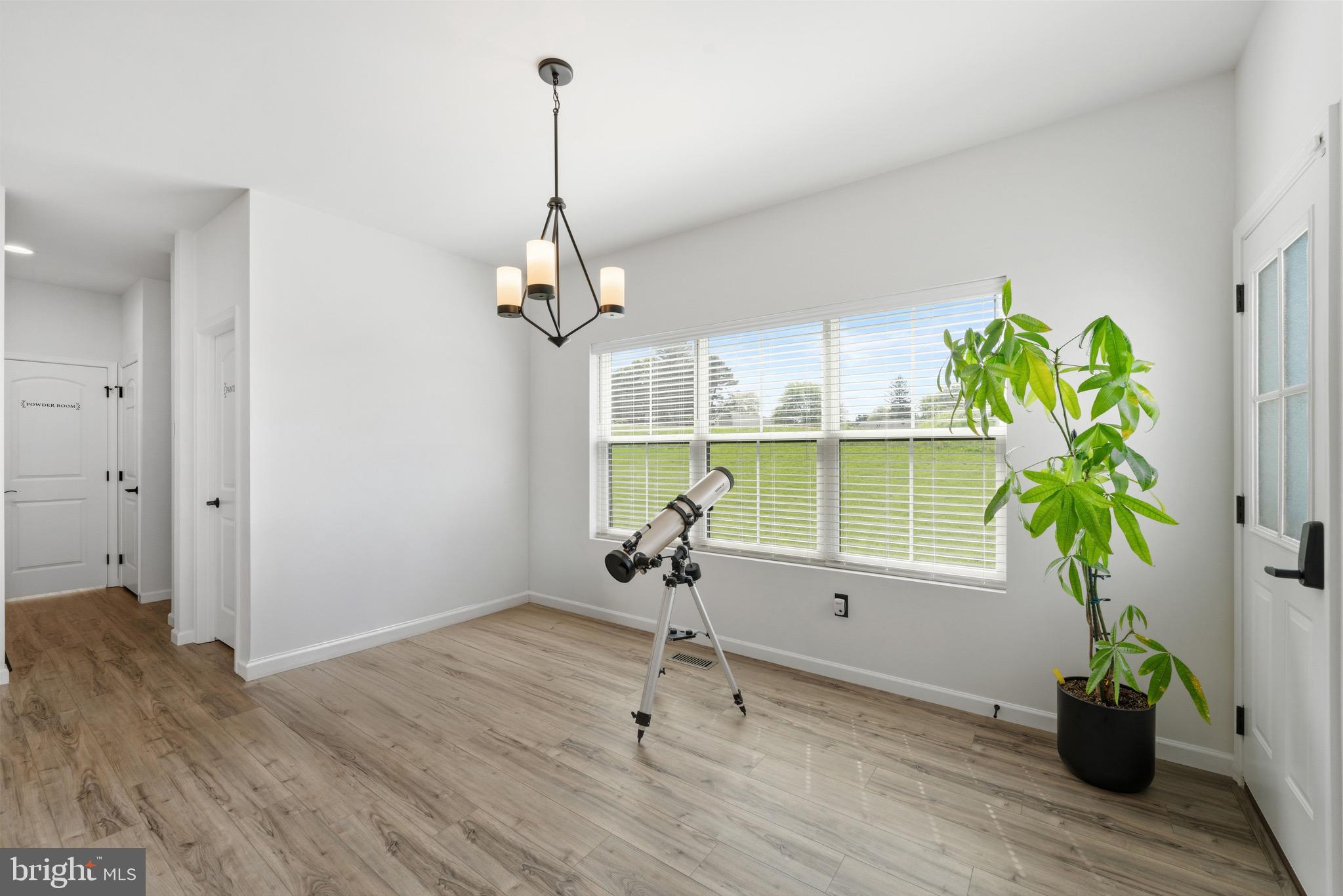 79 Beck Road York, PA 17403 - Photo 16 of 38 a view of a workspace with furniture and a potted plant