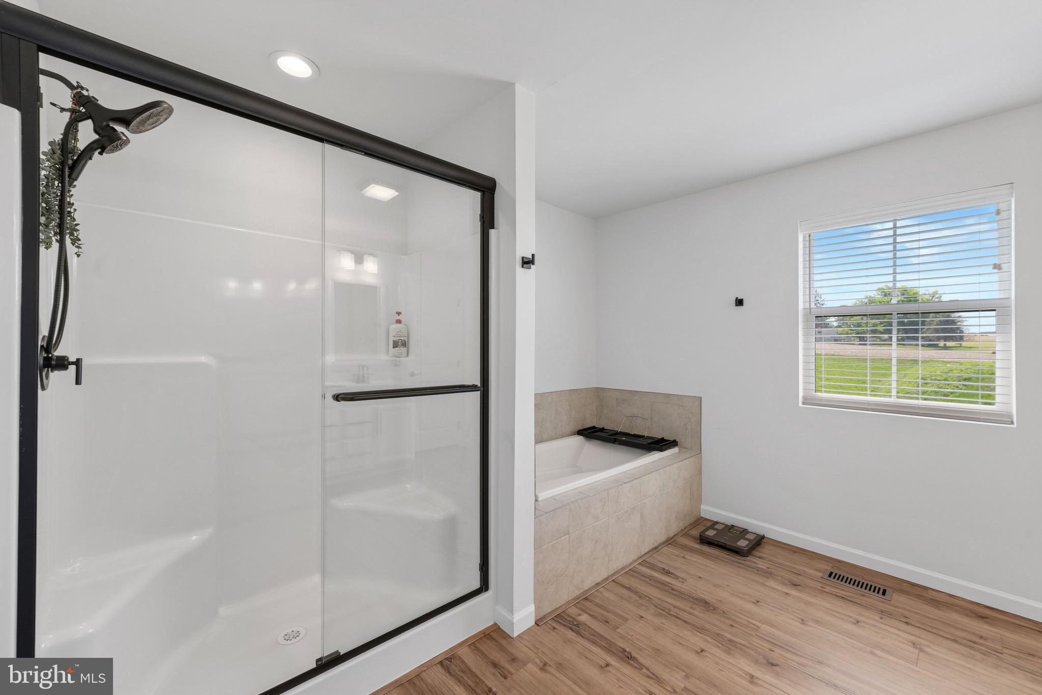 79 Beck Road York, PA 17403 - Photo 25 of 38 a bathroom with a tub and a shower