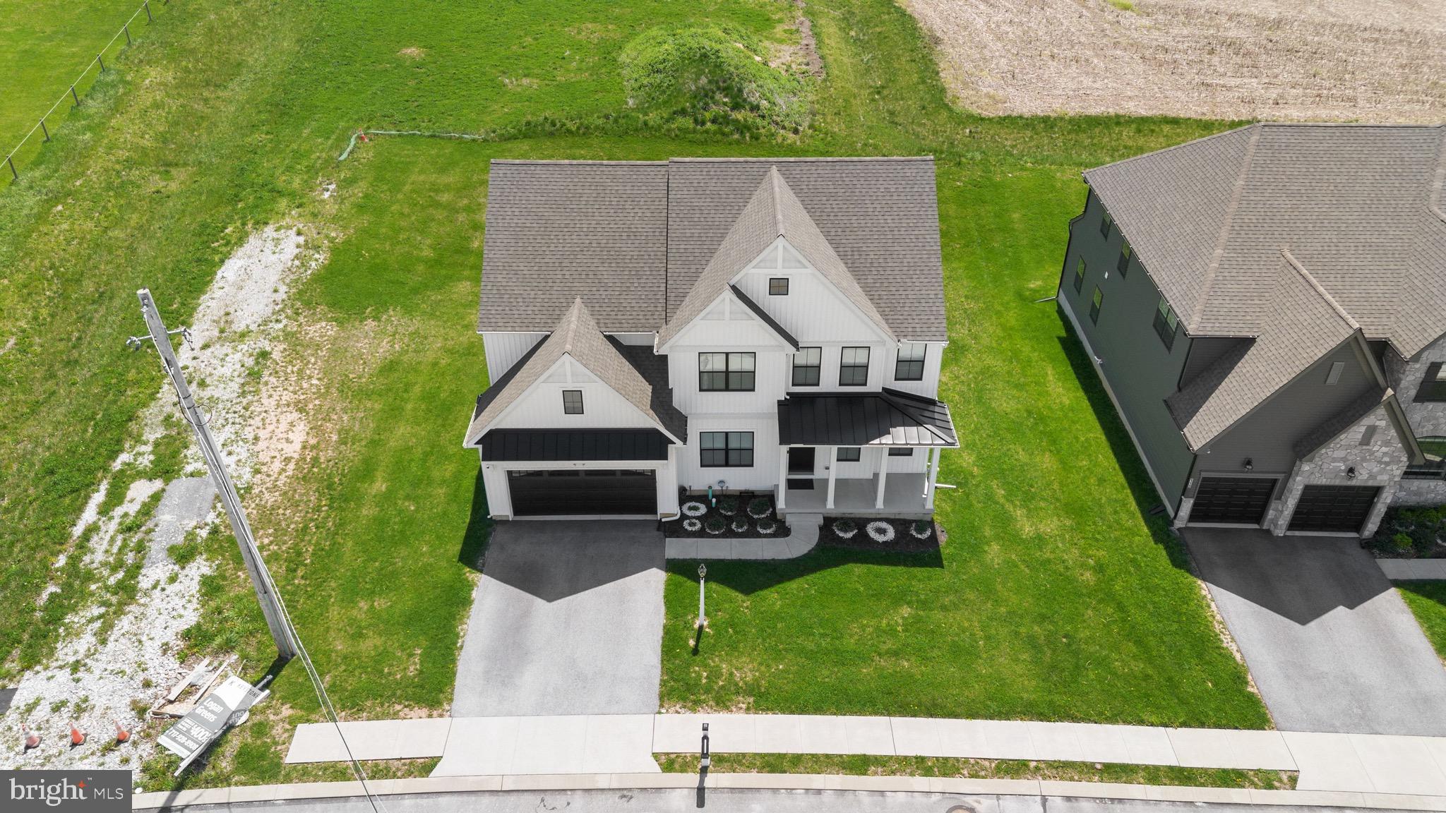 79 Beck Road York, PA 17403 - Photo 32 of 38 an aerial view of a house with a garden