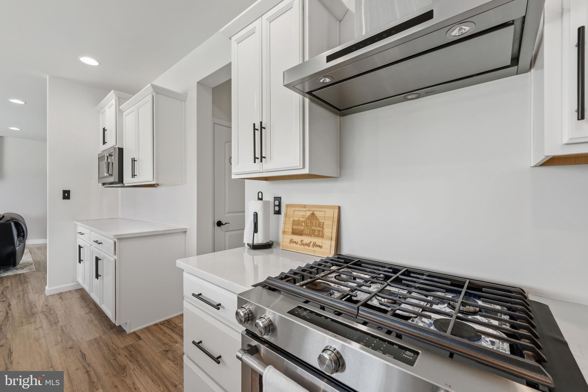 79 Beck Road York, PA 17403 - Photo 9 of 38 a white stove top oven sitting inside of a kitchen