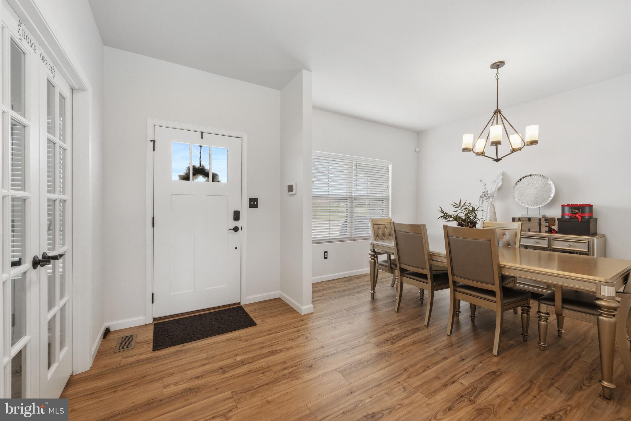 79 Beck Road York, PA 17403 - Photo 10 of 38 a view of a dining room with furniture and wooden floor