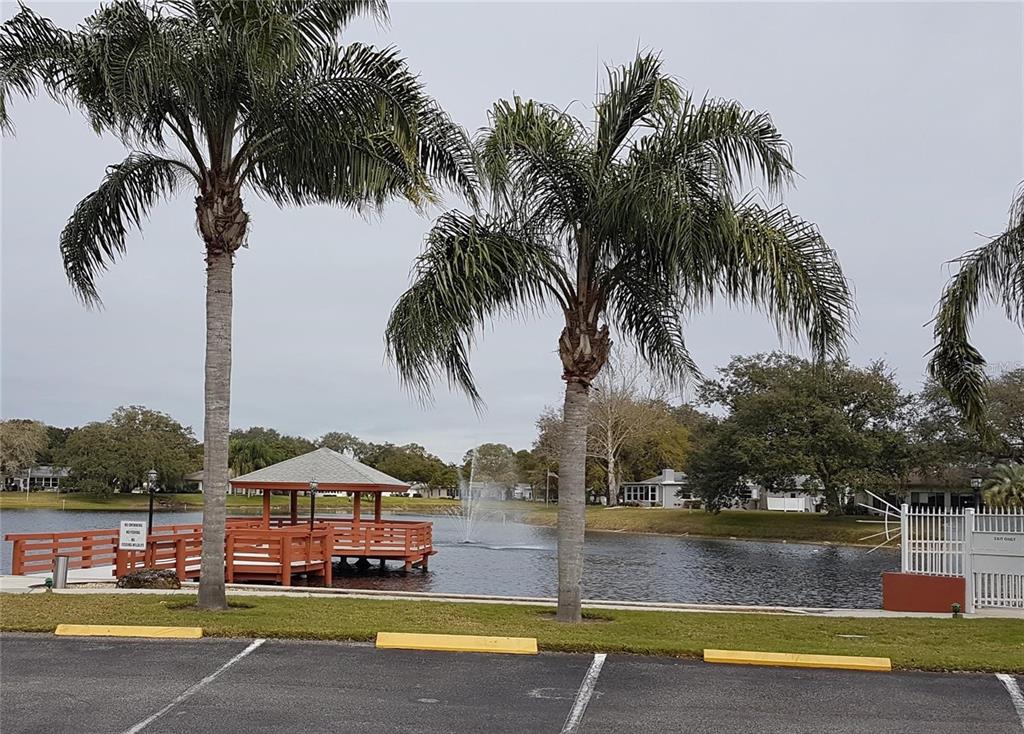 11241 Versailles Lane Port Richey, FL 34668 - Photo 32 of 38 a aerial view of a house with swimming pool
