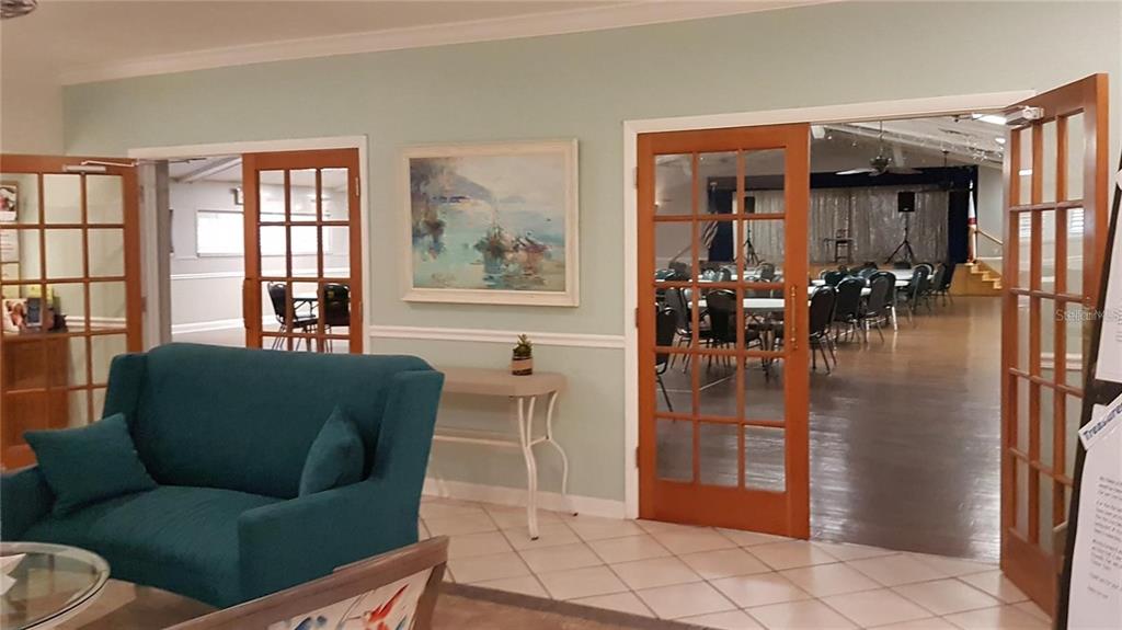 11241 Versailles Lane Port Richey, FL 34668 - Photo 38 of 38 a living room with furniture and a window