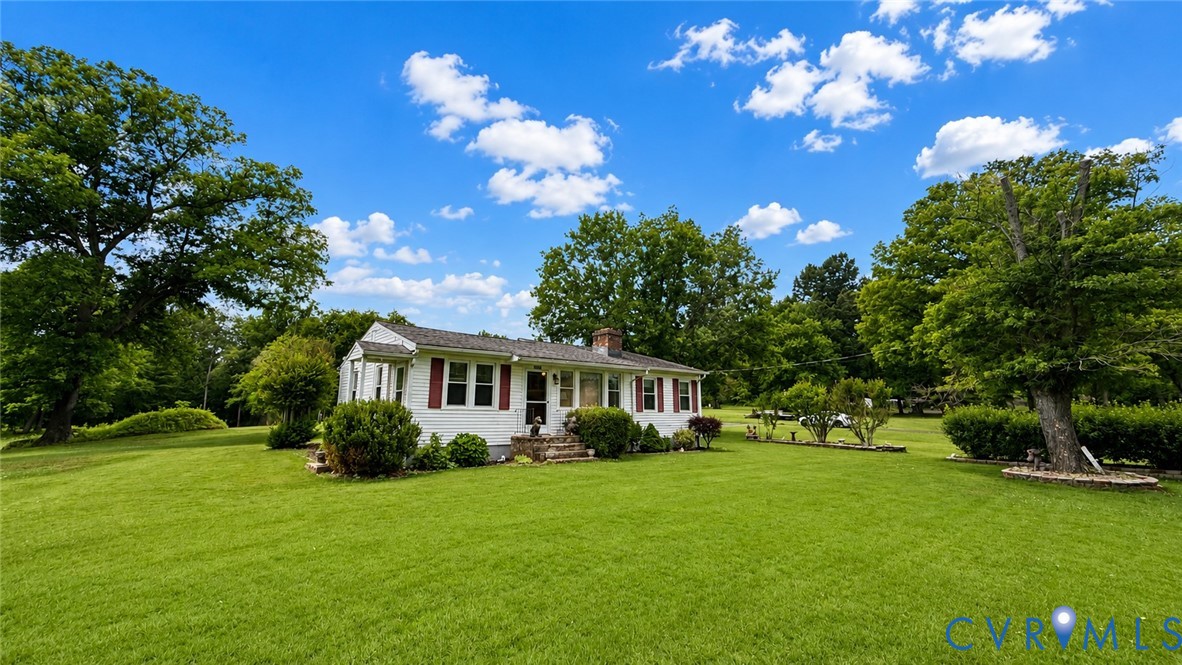 5560 West Hoover Road Reva, VA 22735 - Photo 4 of 32 White single-story residence with red shutters, a
