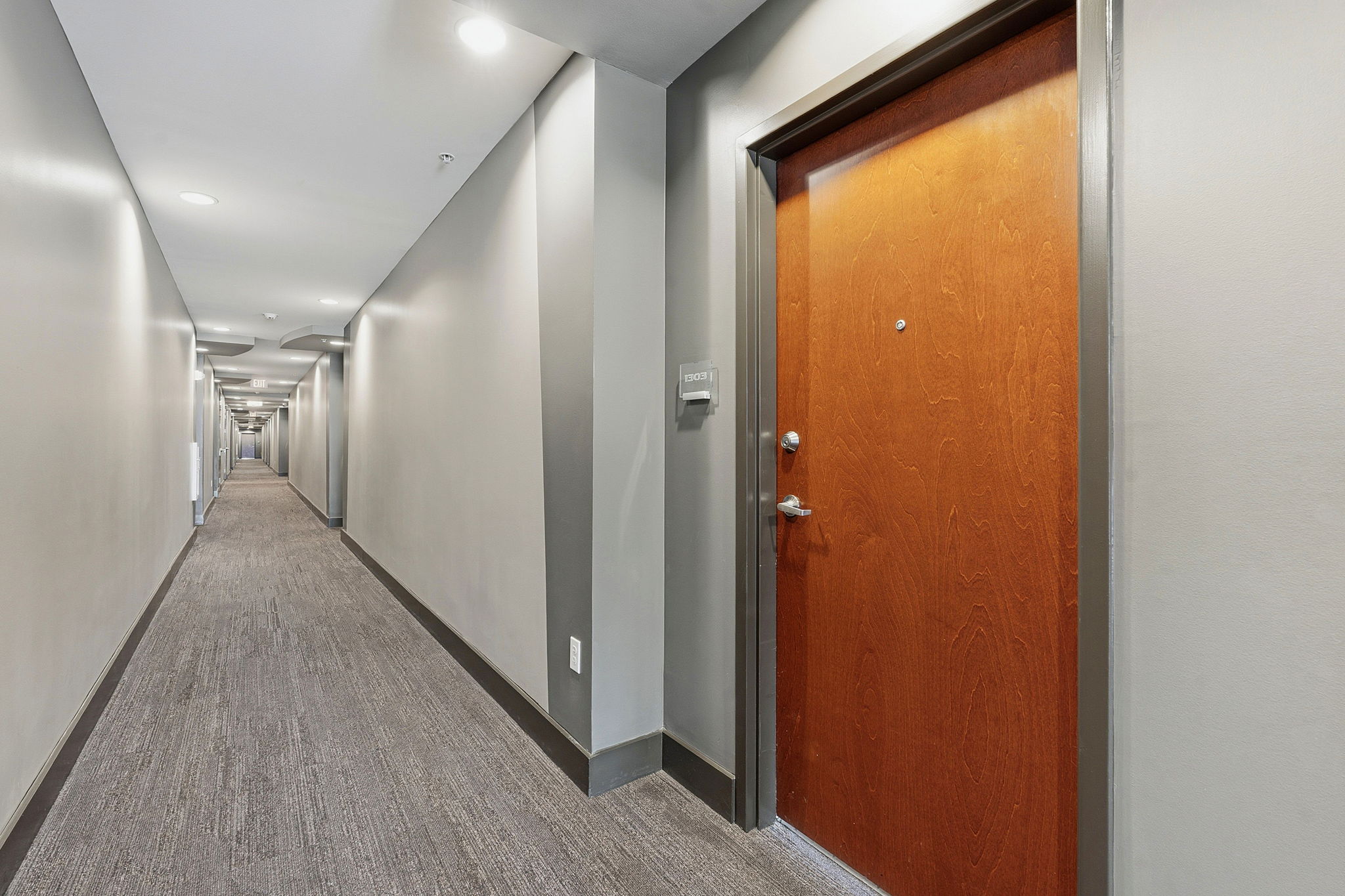 360 Nueces Street, Unit 1303 Austin, TX 78701 - Photo 21 of 40 a view of hallway with wooden floor