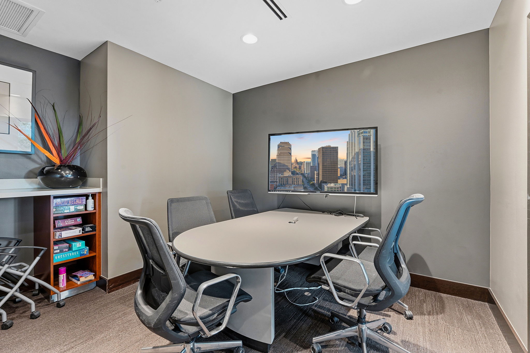 360 Nueces Street, Unit 1303 Austin, TX 78701 - Photo 33 of 40 a view of a workspace with furniture
