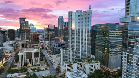 a view of a city with tall buildings