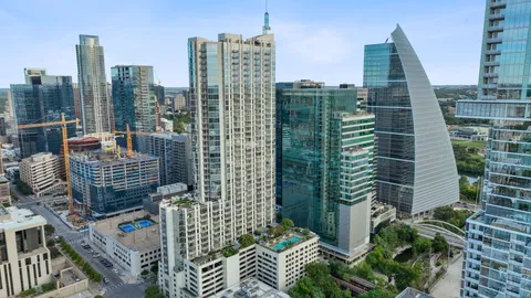 a view of a city with tall buildings