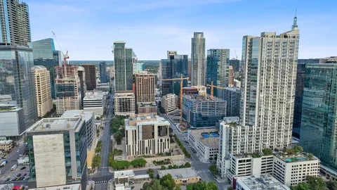 a city view with tall buildings