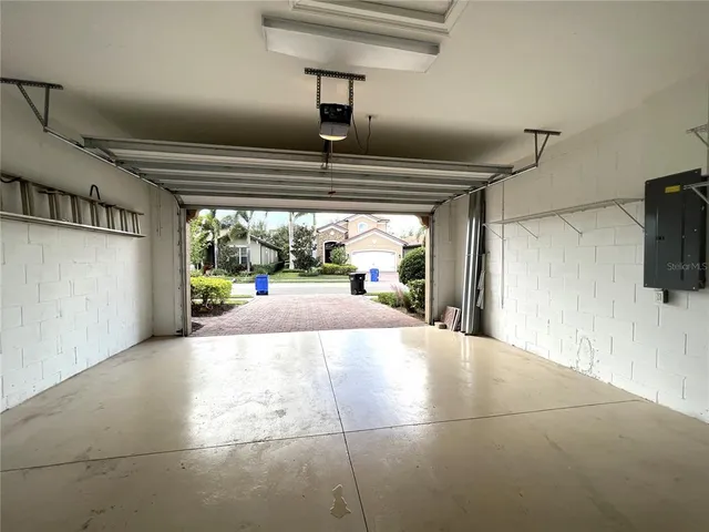a view of outdoor space with wooden floor and windows
