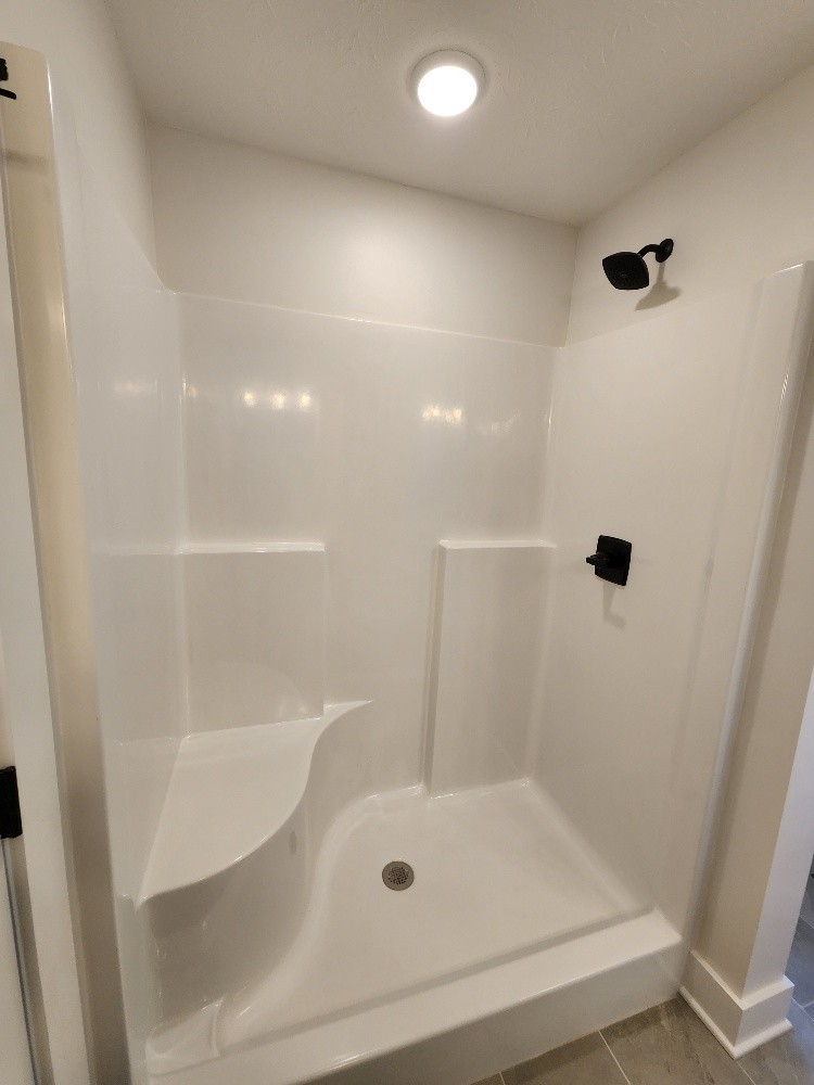 670 Armstrong Road Castalian Springs, TN 37031 - Photo 18 of 25 a bathroom with a shower