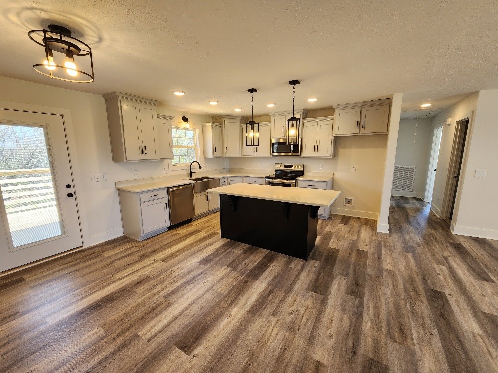 670 Armstrong Road Castalian Springs, TN 37031 - Photo 6 of 25 a large kitchen with a lot of counter space
