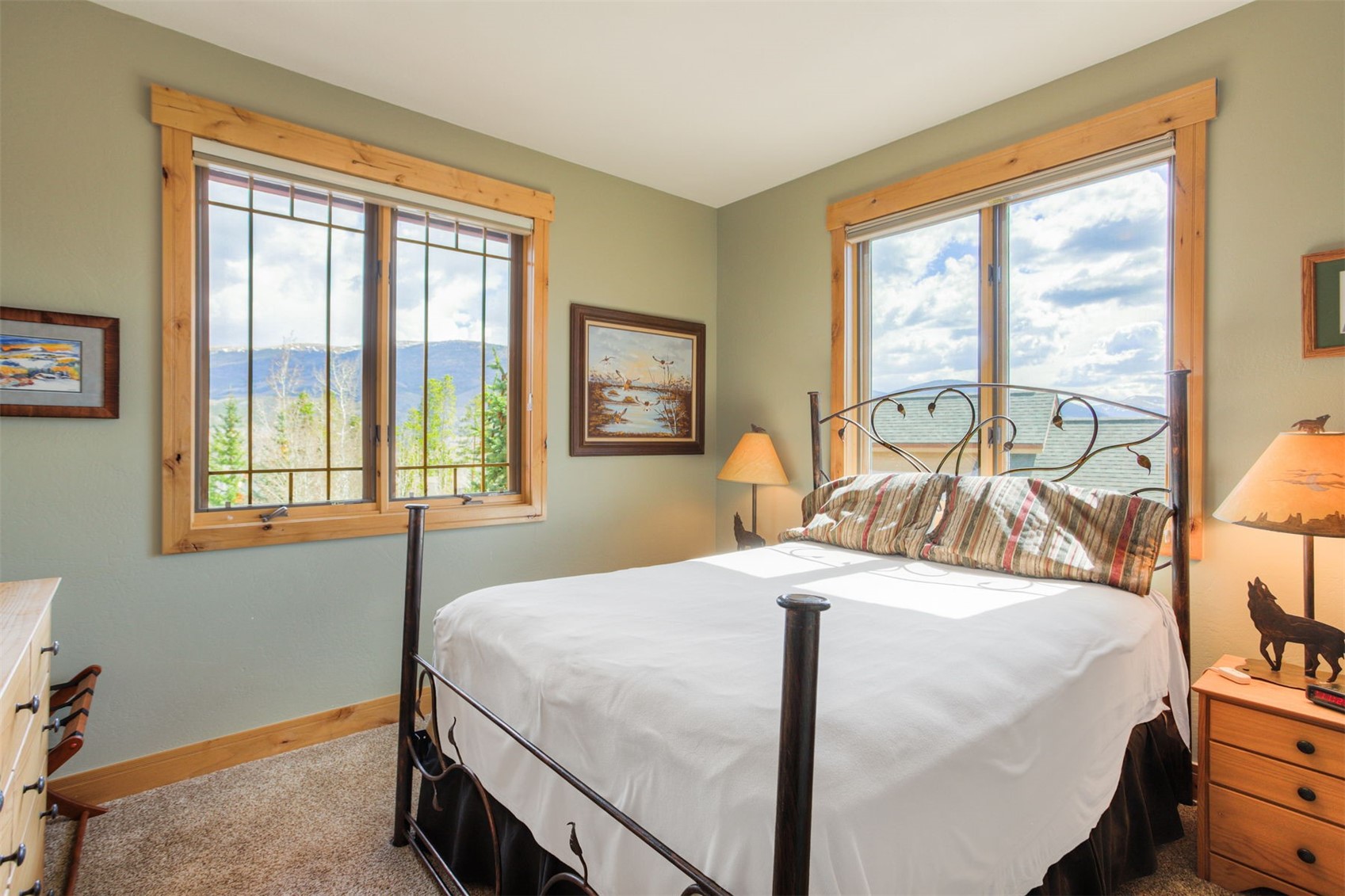 727 Willowbrook Road Silverthorne, CO 80498 - Photo 31 of 47 a bedroom with a bed and a large window