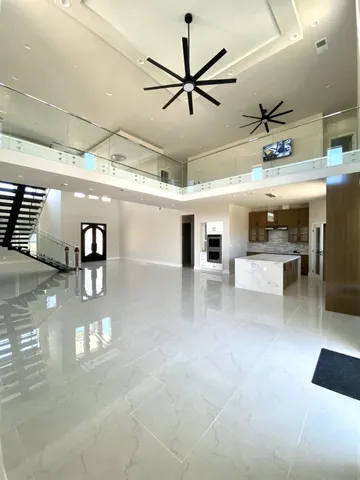 a view of a livingroom with a flat screen tv