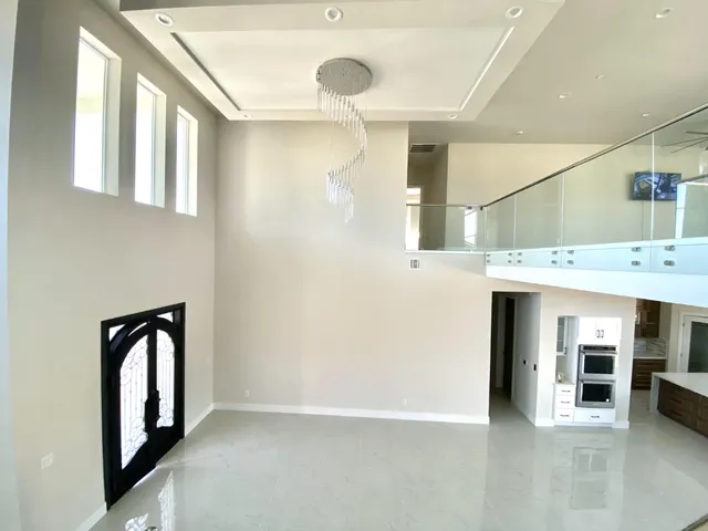 a view of an entryway with a livingroom