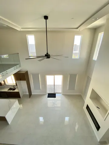 a view of an empty room and window