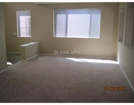 9700 Ridgebluff Avenue Las Vegas, NV 89148 - Photo 4 of 10 Living Room.