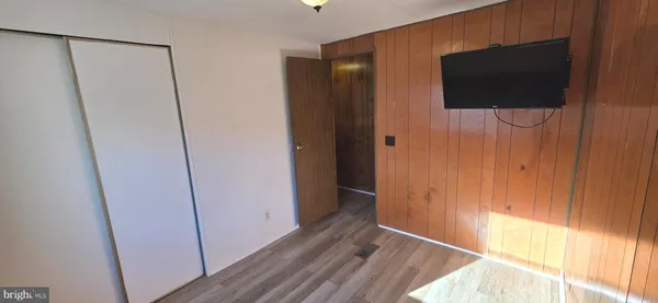 a view of a bathroom from a hallway
