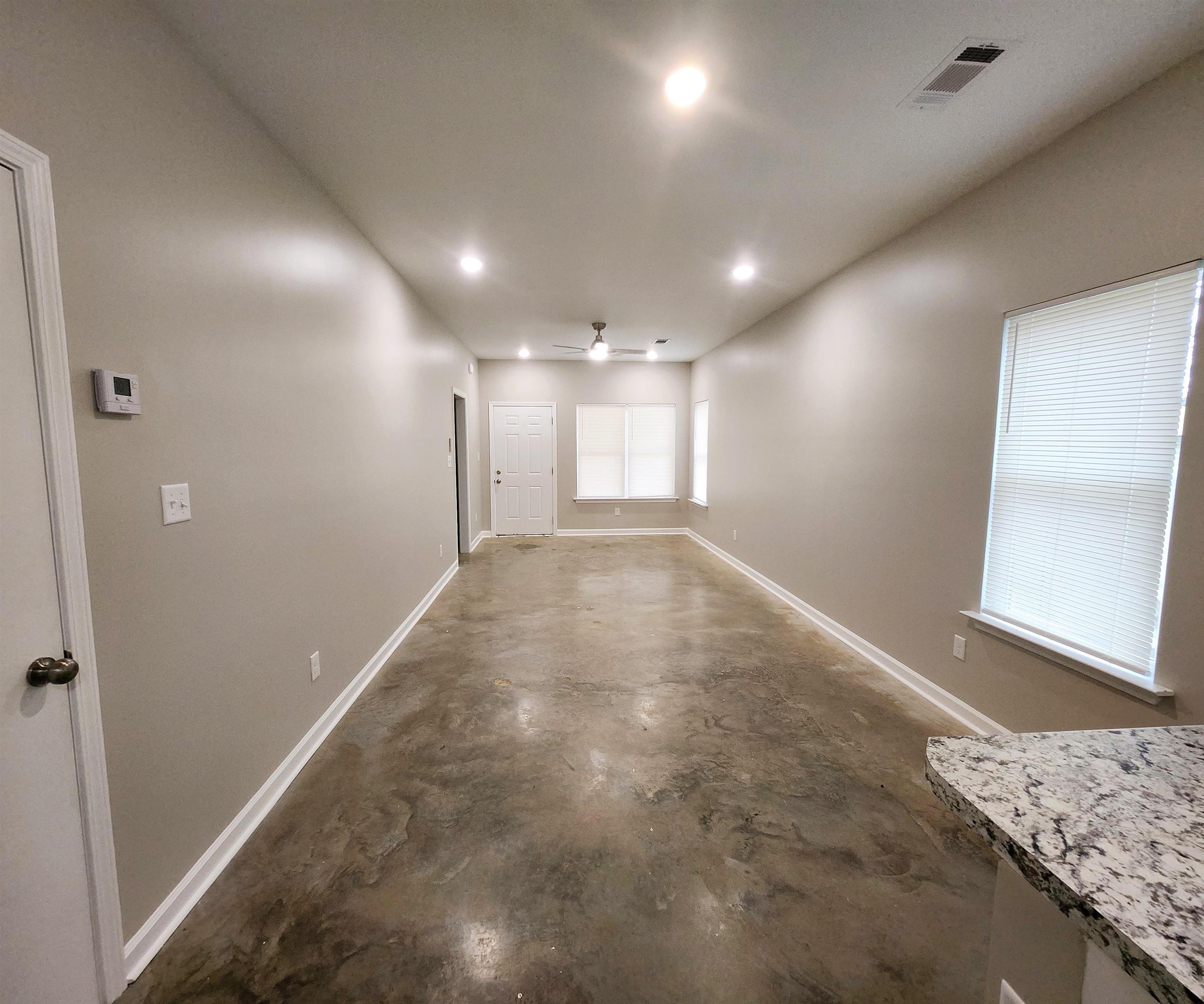 1249 Marksman Street Memphis, TN 38106 - Photo 6 of 10 a view of hallway with a large window
