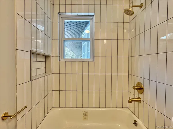 a bathroom with a bathtub