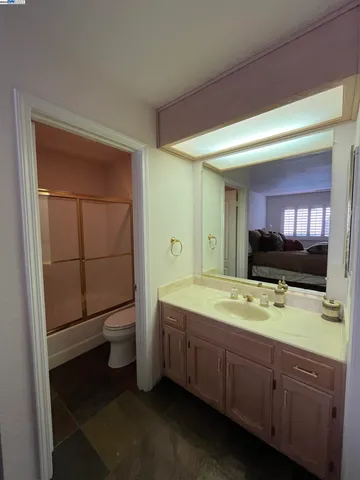 an aerial view of a house with a lake view