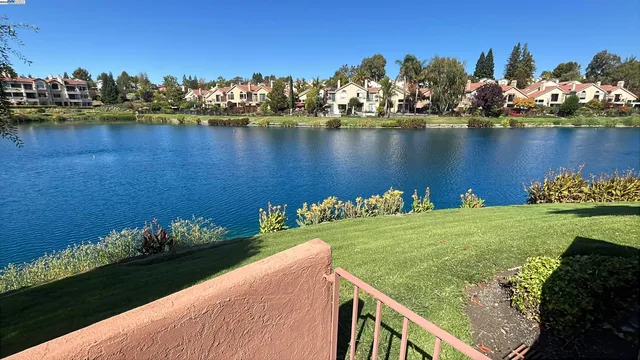 a view of a lake from a terrace