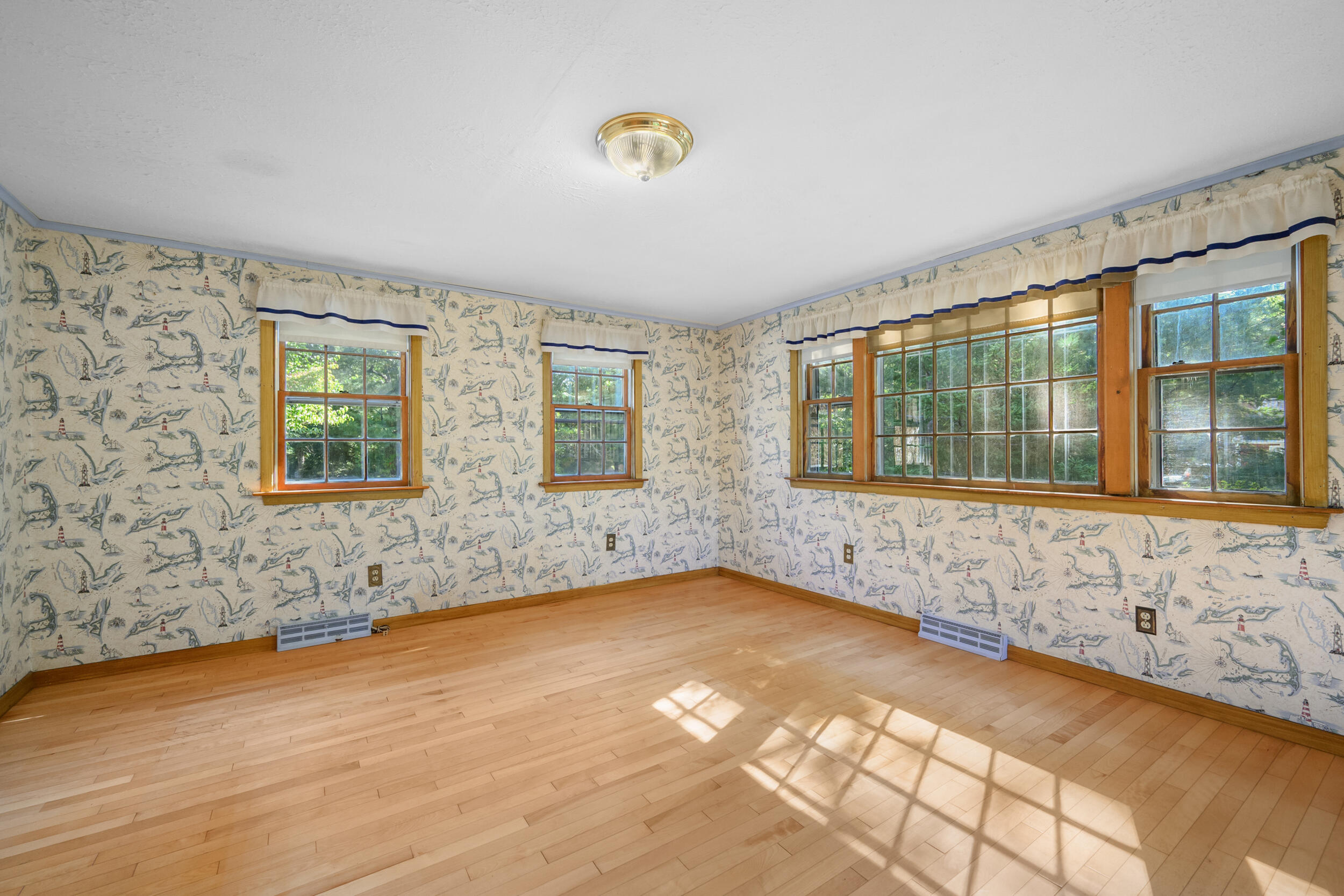 10 Mc Guerty Road Eastham, MA 02642 - Photo 11 of 39 a view of an empty room with a window