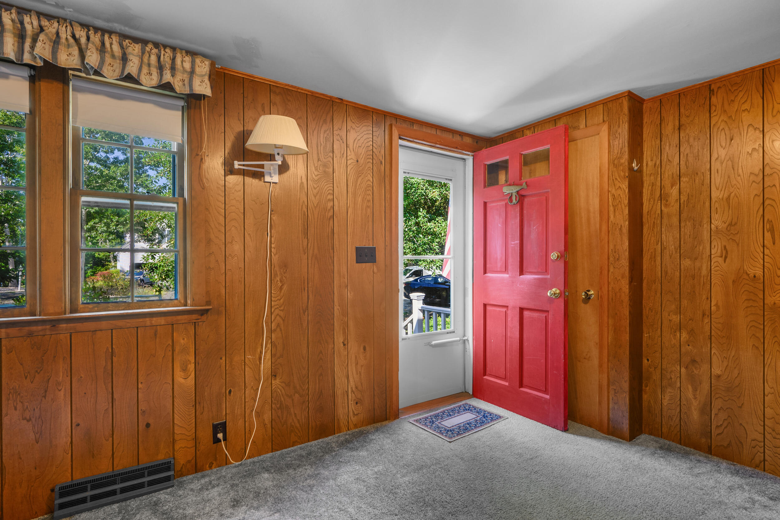 10 Mc Guerty Road Eastham, MA 02642 - Photo 13 of 39 an empty room with windows door and balcony