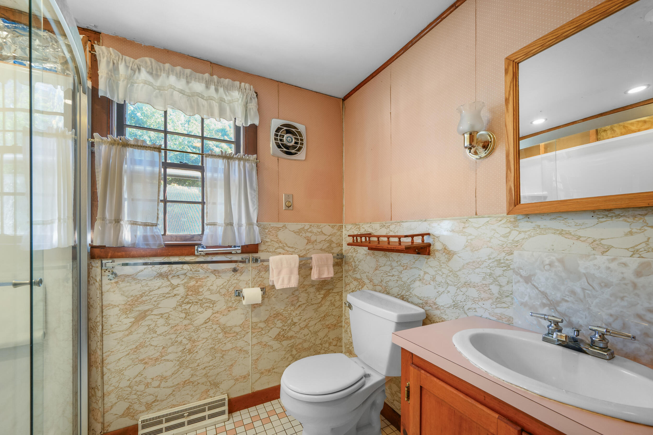 10 Mc Guerty Road Eastham, MA 02642 - Photo 17 of 39 a bathroom with a granite countertop sink toilet and shower